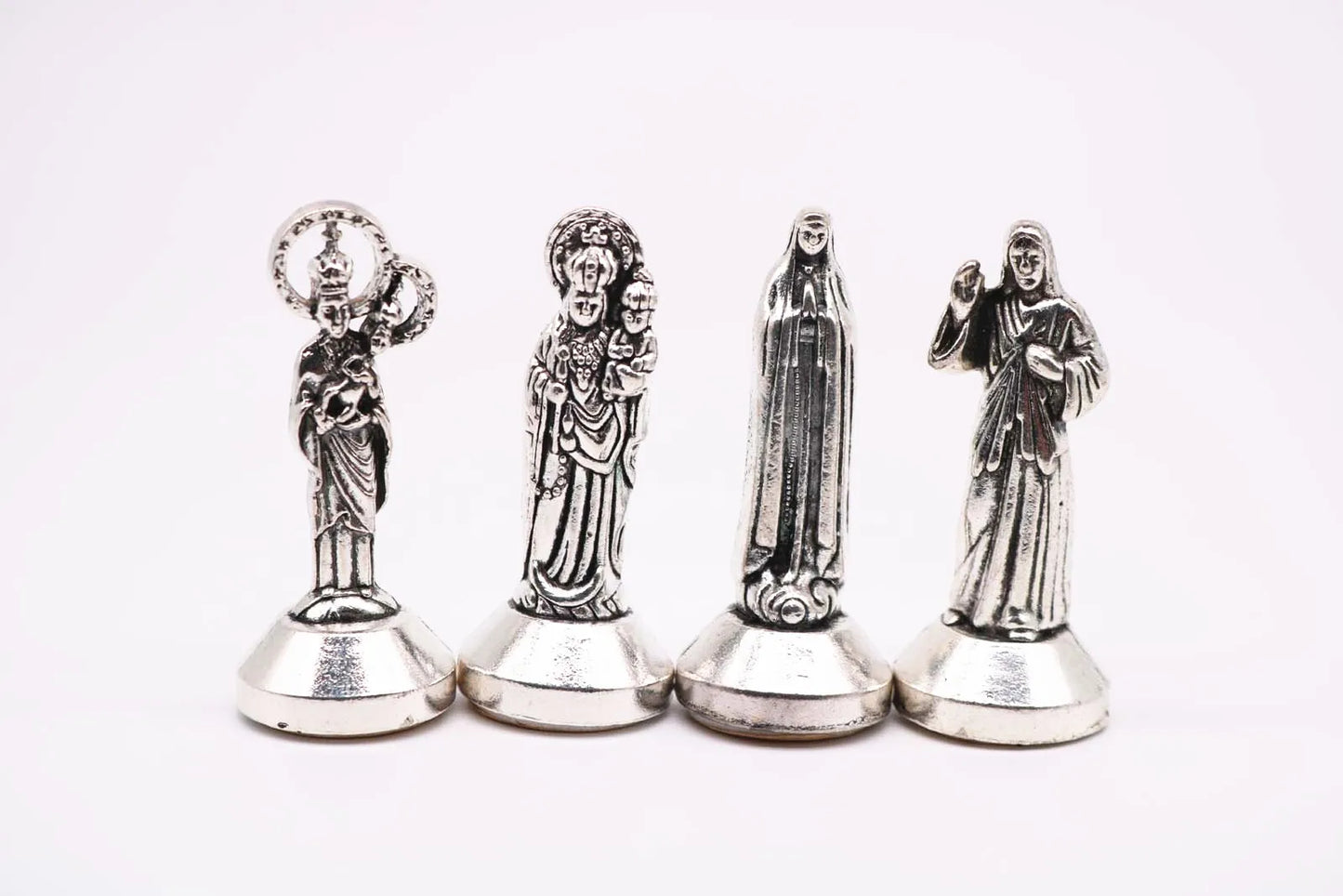 Many styles of Christian decorations. Jesus, Madonna Maria, Rose, Lady Fatima, Figurine. Car dashboard decoration.
